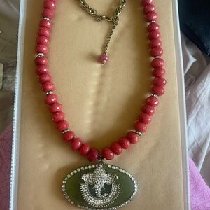 Elegant Red Beaded Necklace with Green Pendant